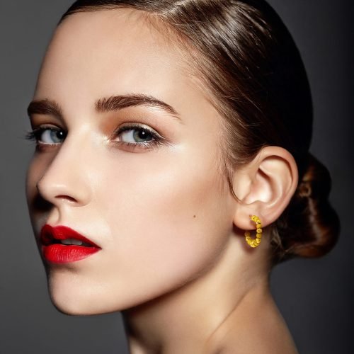 High fashion look.glamor closeup portrait of beautiful sexy stylish brunette Caucasian young woman model with bright makeup, with red lips,  with perfect clean skin in studio